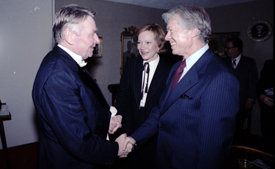 President and Mrs. Jimmy Carter (right) greet Robert Shaw (left) at the White House, March 1980.