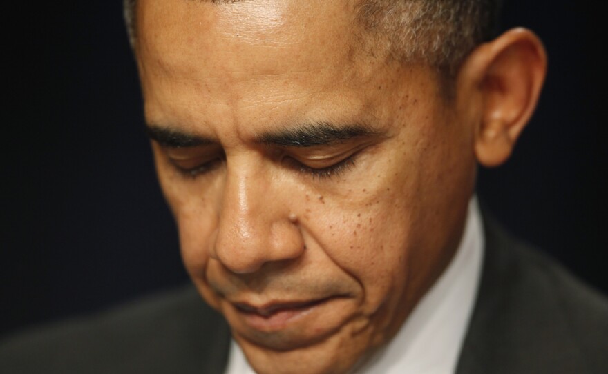President Obama closes his eyes as a prayer is offered at the National Prayer Breakfast in February in Washington, D.C.