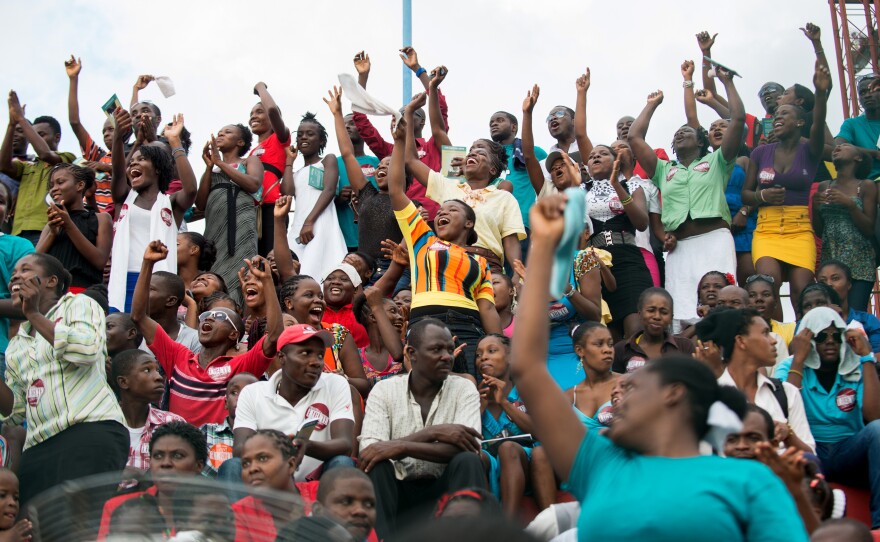 Thousands of Haitians dance and cheer as the finalists sing their songs of child slavery at Port-au-Prince's soccer stadium on Aug. 23.