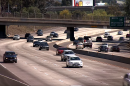 Cars drive on the Interstate-5 freeway in Barrio Logan, Sept. 29, 2016.