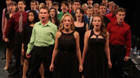 Group rehearsal. Follow the drama and disappointment of high-school theater stars’ aspirations to perform on Broadway.