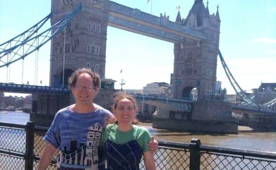 Sam Barsky shows off his London's Tower Bridge with his matching sweater creation, alongside his wife, Deborah.