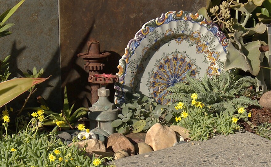 Garden tableau by mixed media artist Betsy Schulz.