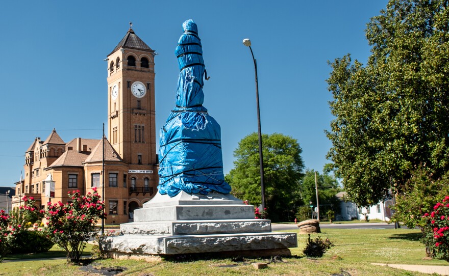 Council Member Johnny Ford and other residents of Tuskegee covered the town square's Confederate marker and monument with plastic. Ford has been trying to have the marker and statue removed since the 1970s, but the United Daughters of the Confederacy has fought to keep it in place.