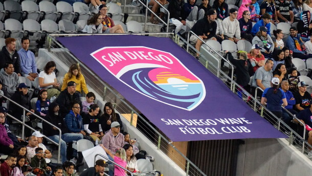 Soccer fans watch an NWSL match featuring San Diego Wave FC at Snapdragon Stadium.