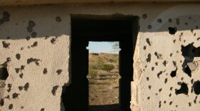 Bullet holes pockmark the walls of an abandoned tienda near Manuel Benavides, Chihuahua, Mexico.
