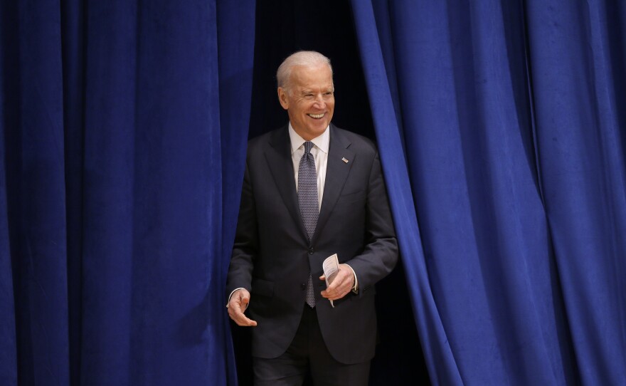 Vice President Biden enters the auditorium before speaking at Drake University in Des Moines, Iowa, in February.