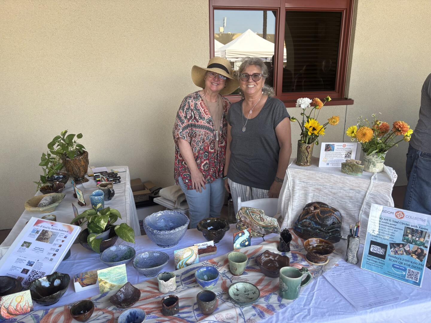 Sally Moluf Hoss (left) and Karen Cadiero-Kaplan (right) stand in front of their shared pottery outside of Chula Vista city hall on Sept 27, 2025.