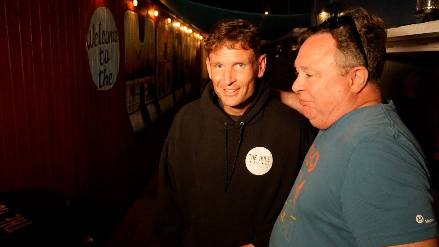 The Hole General Manager Crosby Roper is shown with a customer at The Hole on June 20, 2024.