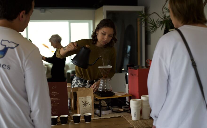 A barista makes a cup of coffee during a training session in Encuentro Cafe in this undated photo.