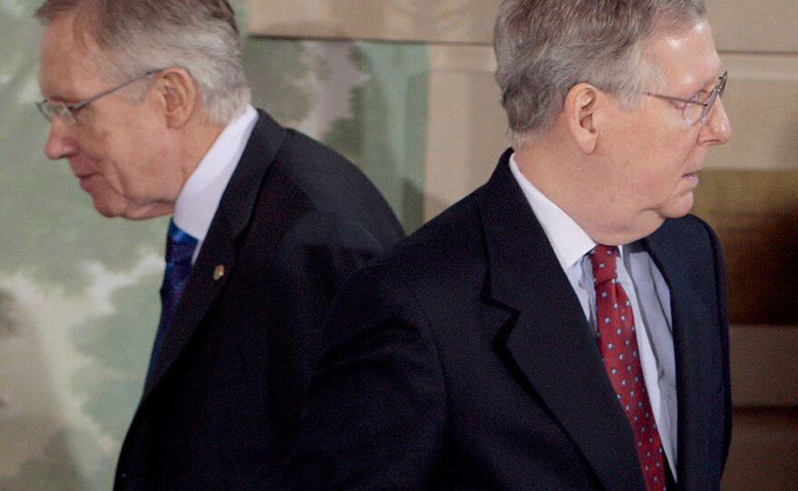 Senate Majority Leader Harry Reid, D-Nev. (left), claimed that "no one has talked about reconciliation" except the Republicans. Senate Minority Leader Mitch McConnell of Kentucky (right) plans to fight this procedural maneuver.