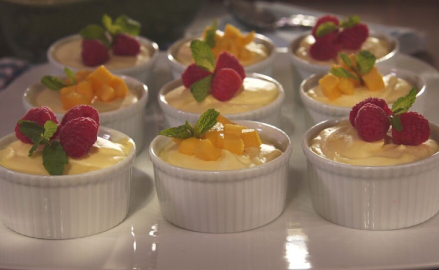 Pati hosts a backyard picnic with mango puffs for dessert topped with fresh raspberries and mango.