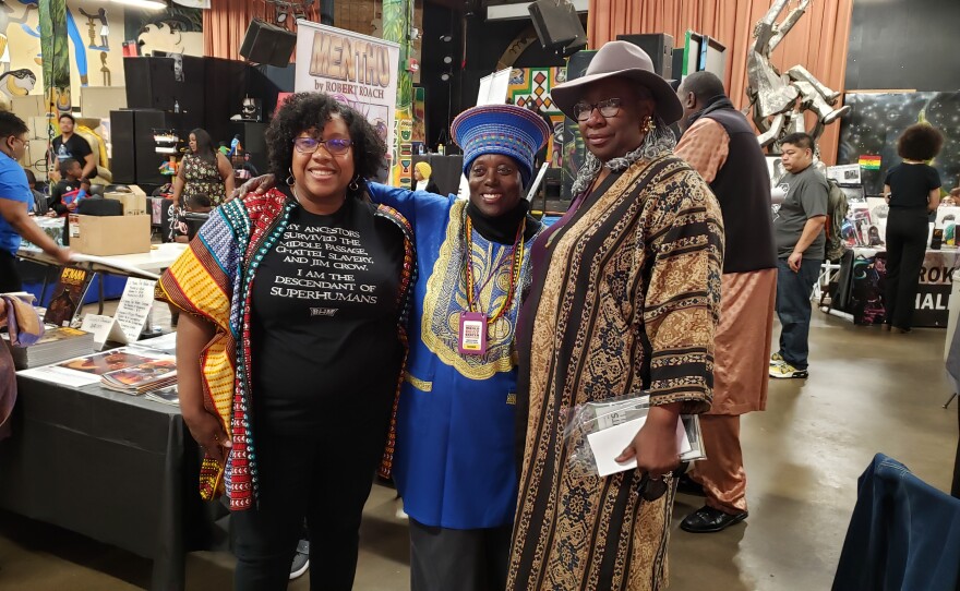 LaWana Richmond (left) and WorldBeat Cultural Center founder/executive director Makeda 'Dread' Cheatom (center) at the 2020 Black Comix Day. Feb. 22, 2020