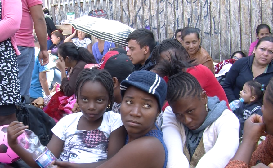 Migrants from Haiti and Africa wait outside the San Ysidro Port of Entry, June 2, 2016.