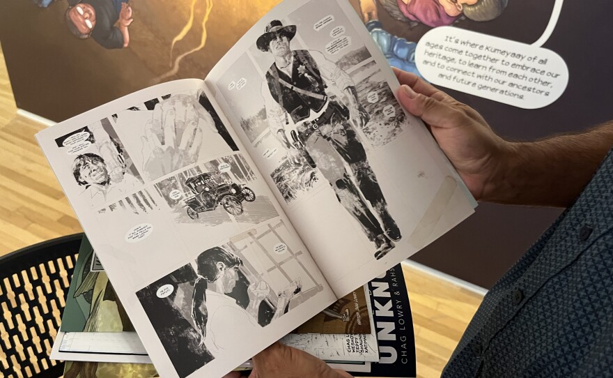 Native comic book creator Chag Lowry flips through the pages of some of his past works inside the La Jolla Historical Society, July 17, 2025.