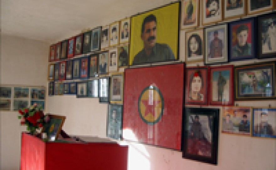 A memorial for slain rebel fighters from the Kurdistan Workers Party, or PKK, along with a portrait of the Kurdish separatist groups leader, Abdullah Ocalan, who is imprisoned in a Turkish jail. This memorial in Northern Iraq was reportedly destroyed by Turkish airstrikes in December 2007.