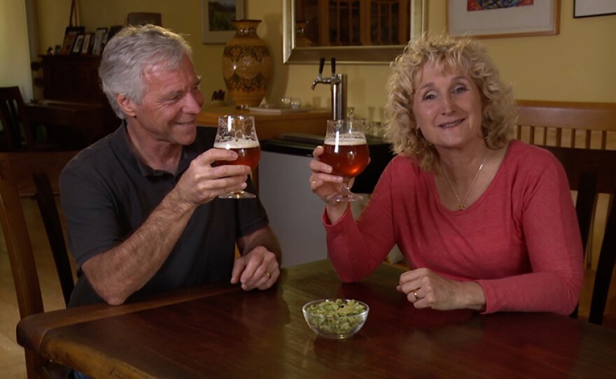 Host Nan Sterman (right) and Curt taste beer.