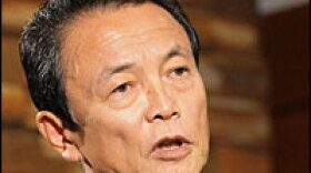 Aso speaks to the media Sept. 28 at his office in Tokyo. Aso faced his first political setback just days after taking office, when his transport minister, Nariaki Nakayama, was forced to resign over a series of embarrassing gaffes.