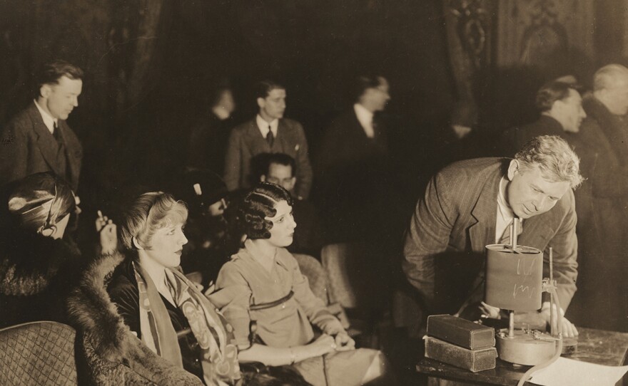 William Marston (far right) conducting his Reaction Test on movie audiences for Metro Gold Meyer, fall 1928.