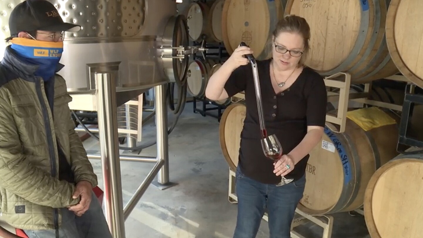 Wine tasting with Vesper Vineyards founders Chris Broomell (left) and Alysha Stehly (right).