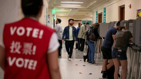 Voters fill out their ballots at San Francisco City Hall on Super Tuesday in 2020.