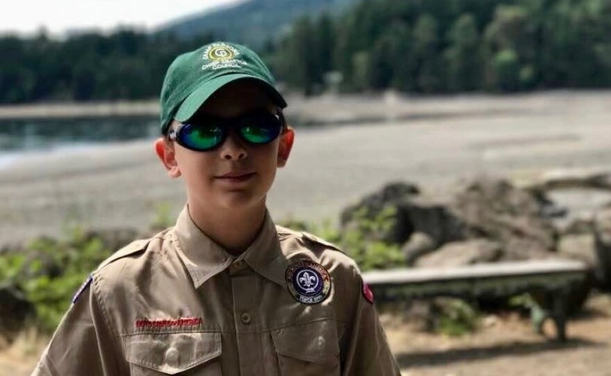 Boy Scout Charlie Underdown of Seattle says that welcoming girls into the group fits with the Scout Law, which says to be "trustworthy, loyal, helpful, friendly, courteous, kind, obedient, cheerful, thrifty, brave, clean and reverent."