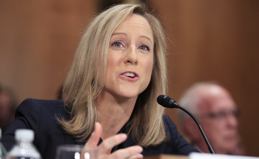 Kathy Kraninger, President Trump's nominee to run the Consumer Financial Protection Bureau, testifies before the Senate Banking Committee on Thursday.