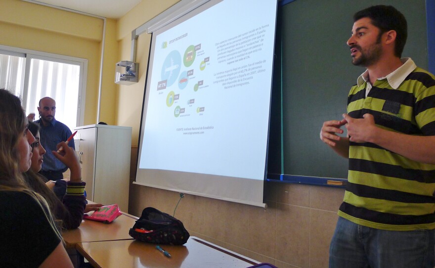 Juan Alberto Ruiz Casado speaks to high school students in Spain's Malaga province about challenging stereotypes of immigrants. Here he explains how most immigrants arrive in Spain by airplane — not by rubber raft.