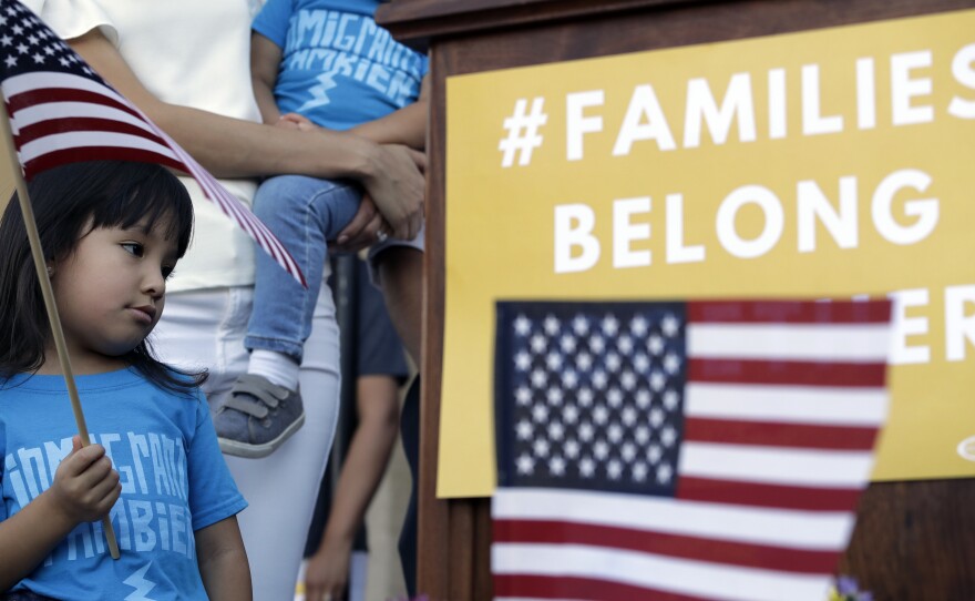 Andrea Elena Castro, daughter of Rep. Joaquin Castro, D-Texas, holds a U.S. flag during a Rally For Our Children event on May 31 to protest the "zero tolerance" immigration policy that has led to the separation of families.