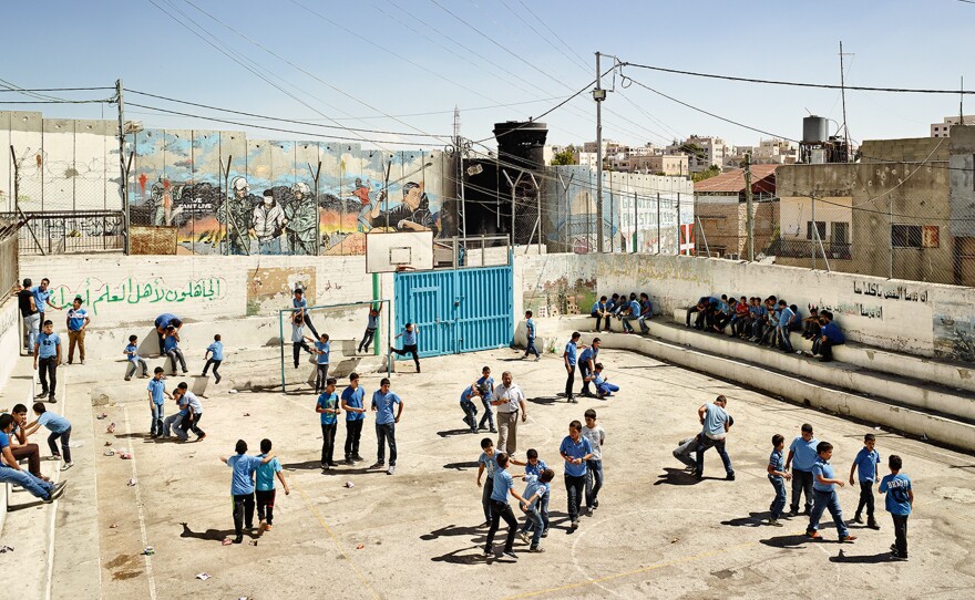 At the Aida Boys School, in the West Bank town of Bethlehem, the walls are extra thick to protect students against bullets.