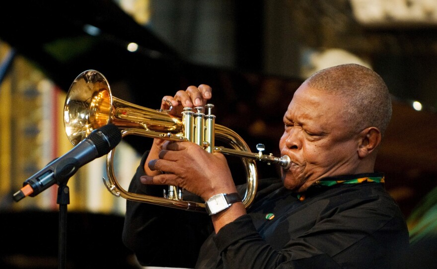 South African jazz musician Hugh Masekela performs during the Observance for Commonwealth Day service at Westminster Abbey in central London in March 2012.