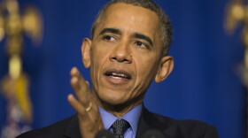 President Barack Obama discusses the COP21 climate change summit during a news conference at the Organization for Economic Cooperation and Development Centre in Paris, Dec. 1, 2015. 