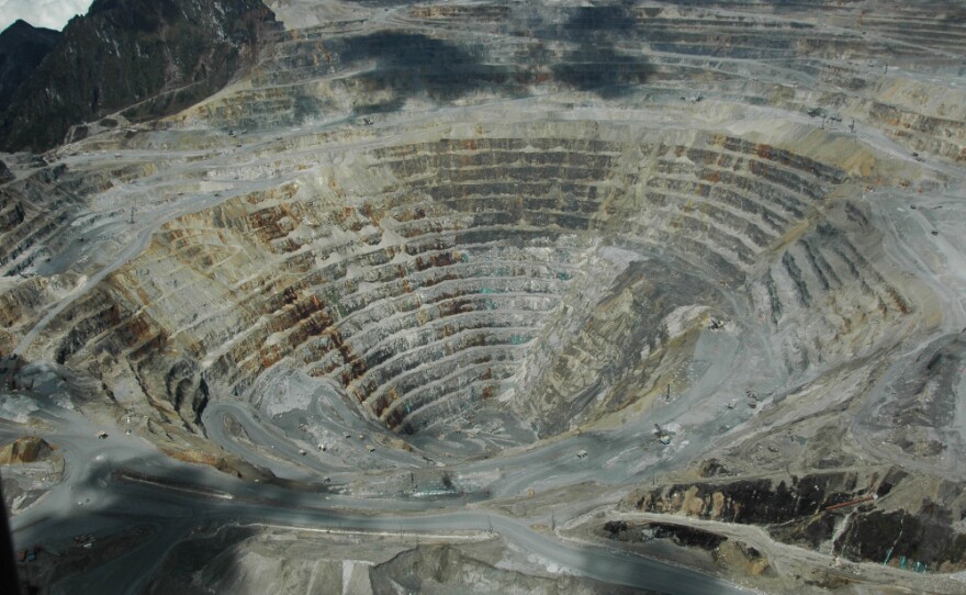 Critics accuse Freeport-McMoRan not only of underpaying workers but also of destroying the environment in remote Papua and of decades of complicity in human rights abuses by the Indonesian military. Here, an aerial photograph of the Grasberg mining complex.