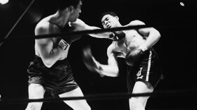 In their first meeting at Yankee Stadium in 1936, Max Schmeling lands a left to the face of Joe Louis during their bout for the World Heavyweight Championship. Schmeling's ultimate victory would thrust him into the awkward role of a Nazi propaganda symbol.