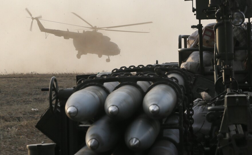 A Ukrainian army helicopter flies over their positions in Debaltsevo, Donetsk region, Ukraine, on Friday.