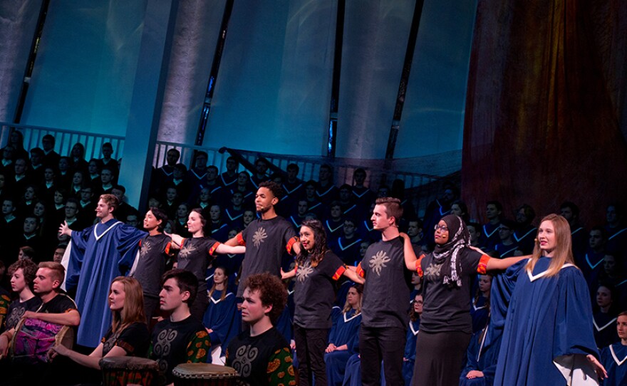 From Christ Chapel on the Gustavus Adolphus campus in Saint Peter, Minn., three choirs, an orchestra, dancers and a theatre troupe celebrate the theme “from the cradle of human kind to the ends of the earth,” embracing community and the interconnectedness of all human kind.