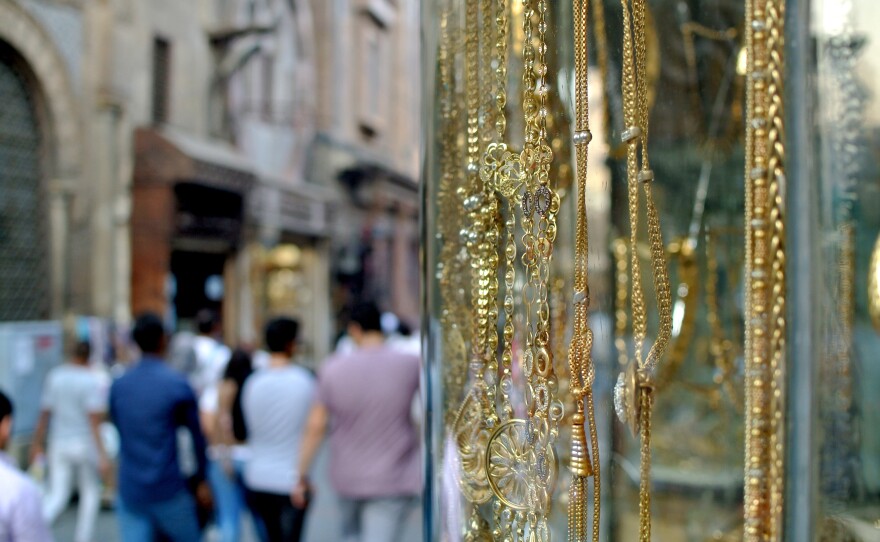 In some of Cairo's working-class communities, the groom is responsible for providing the apartment and furniture, while the bride provides a refrigerator, stove and washing machine. The engagement is sealed with a gift of gold jewelry from groom to bride.