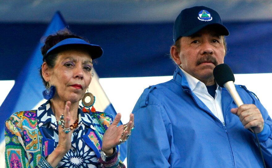 President Daniel Ortega and his wife, Vice President Rosario Murillo, lead a rally in Managua, Nicaragua, Sept. 5, 2018.