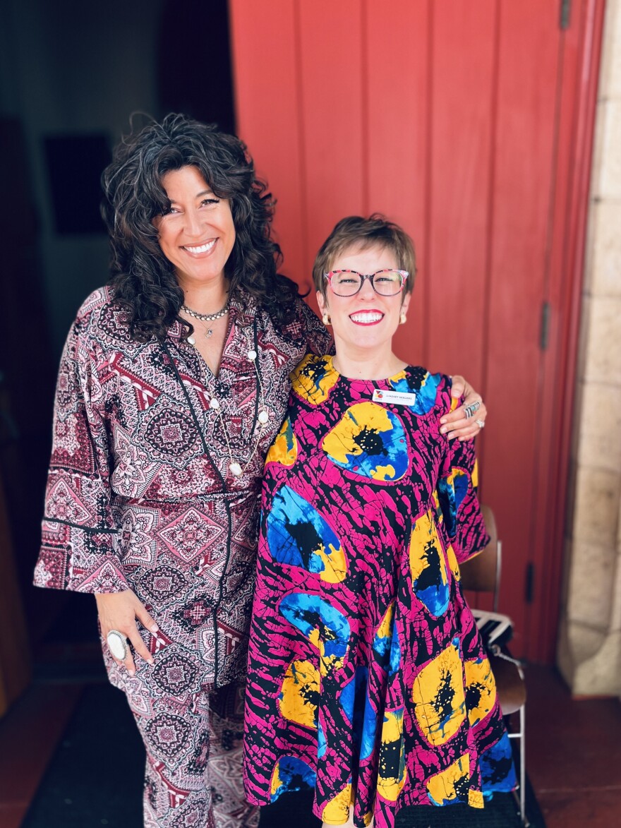 CEO Steph Johnson (left) and executive director Lindsey Seegers (right) pose for a photo outside of St. Paul's Episcopal Cathedral.