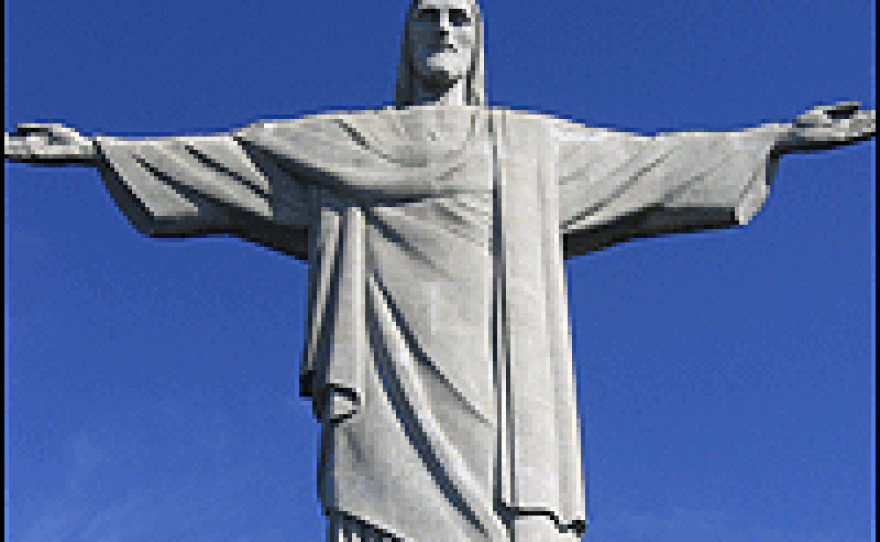 Rio de Janeiro's Christ the Redeemer Statue stands atop the peak Corcovado. Its name is derived from its form, which resembles a hunchback.