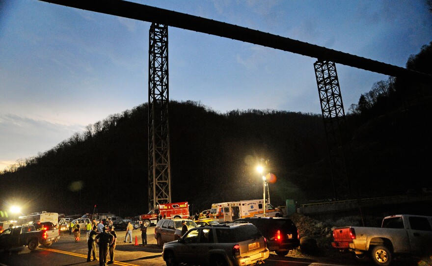 Police direct traffic at Massey Energy's Upper Big Branch coal mine in Montcoal, W.Va., after an explosion there killed 29 men in April 2010. Upper Big Branch had delinquent mine safety penalties at the time of the explosion.