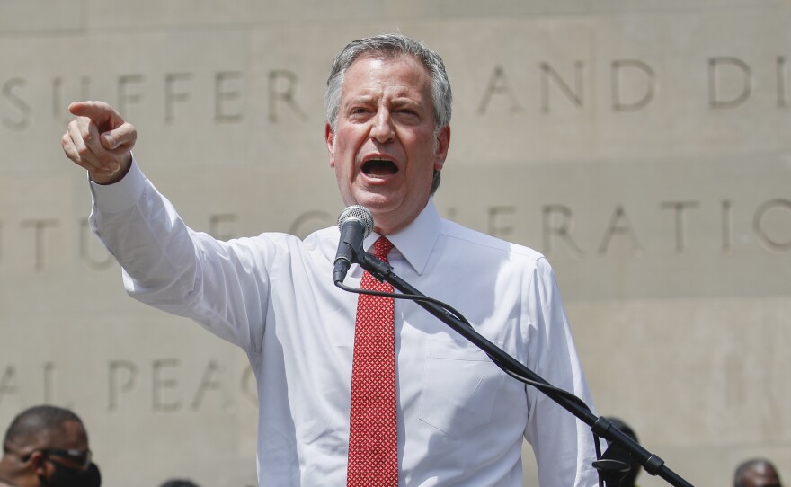 New York City Mayor Bill de Blasio, shown here at an event last month, defended the move to shift funds away from the city's police department.