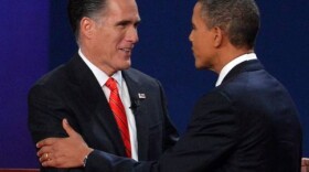 US President Barack Obama (R) and Republican Presidential candidate Mitt Romney (L) shake hands moments before the start of the first presidential debate at Magness Arena at the University of Denver in Denver, Colorado, October 3, 2012. 