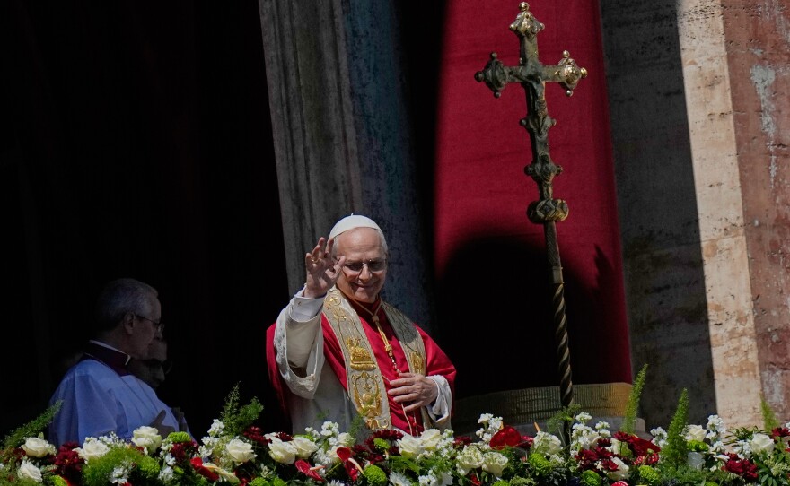 Pope Leo XIV addresses the faithful after delivering the Urbi et Orbi blessing - Latin for "to the city of Rome and to the world" - from the central loggia of St. Peter's Basilica at the end of Easter Mass he presided over in St. Peter's Square at the Vatican, Sunday, April 5, 2026.
