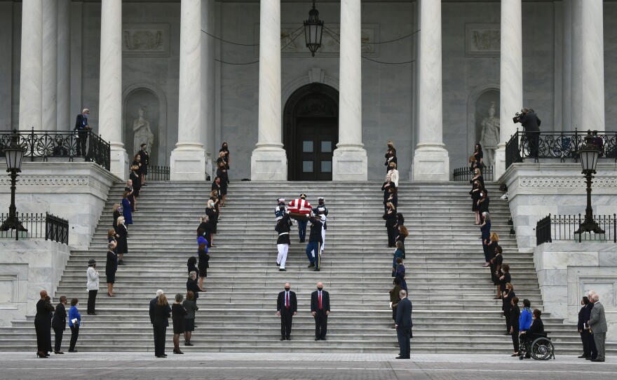 Justice Ruth Bader Ginsburg's casket leaves the U.S. Capitol.