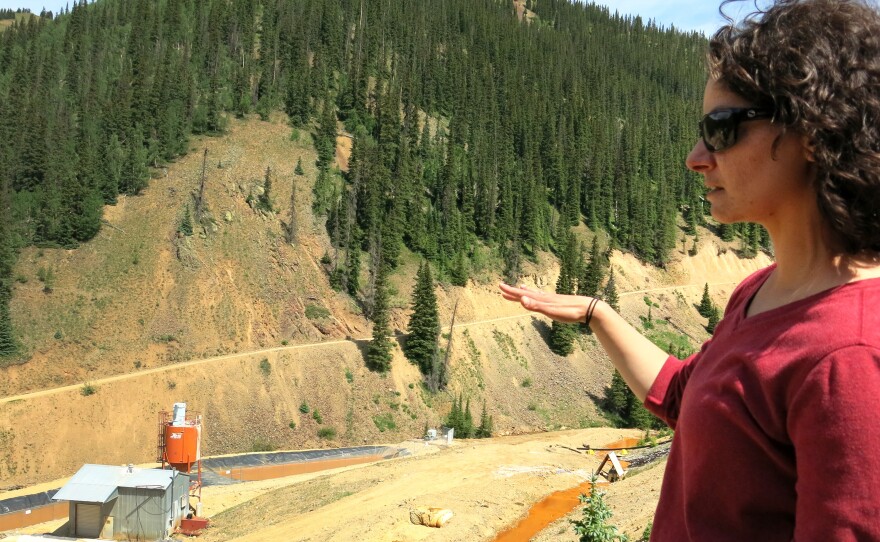 Joyel Dhieux, EPA on-scene coordinator, looks at an old water treatment plant that stopped operating near the base of the Gold King Mine in the early 2000s. The EPA built its own temporary plant in October 2015 after the Gold King Mine spill.