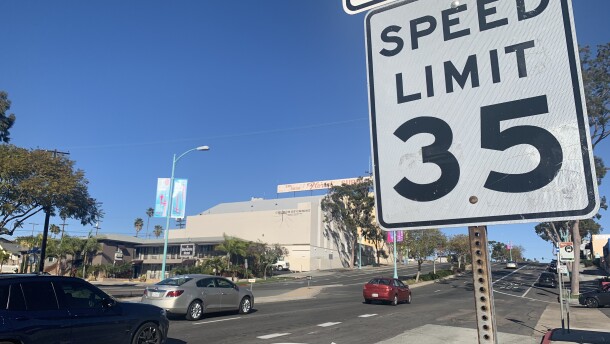 Cars drive past a 35 mph speed limit sign on El Cajon Boulevard, March 8, 2022.