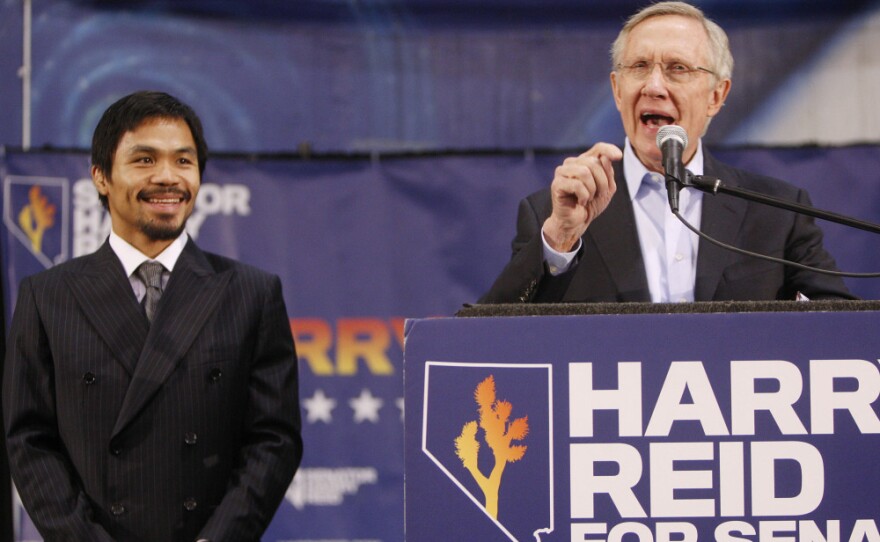 Senate Majority Leader Harry Reid enlisted the support of boxer Manny Pacquiao to court Latino voters.