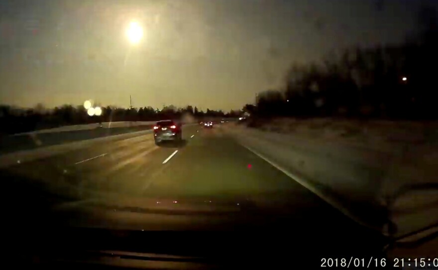 A car dashcam captures a view of a meteor near Bloomfield Hills, Mich., on Tuesday in this still image from video obtained from social media.