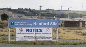 A sign informs visitors of prohibited items on the Hanford Nuclear Reservation near Richland, Wash., July 9, 2014. 